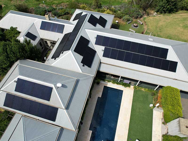 Residential property with outdoor pool and solar panels